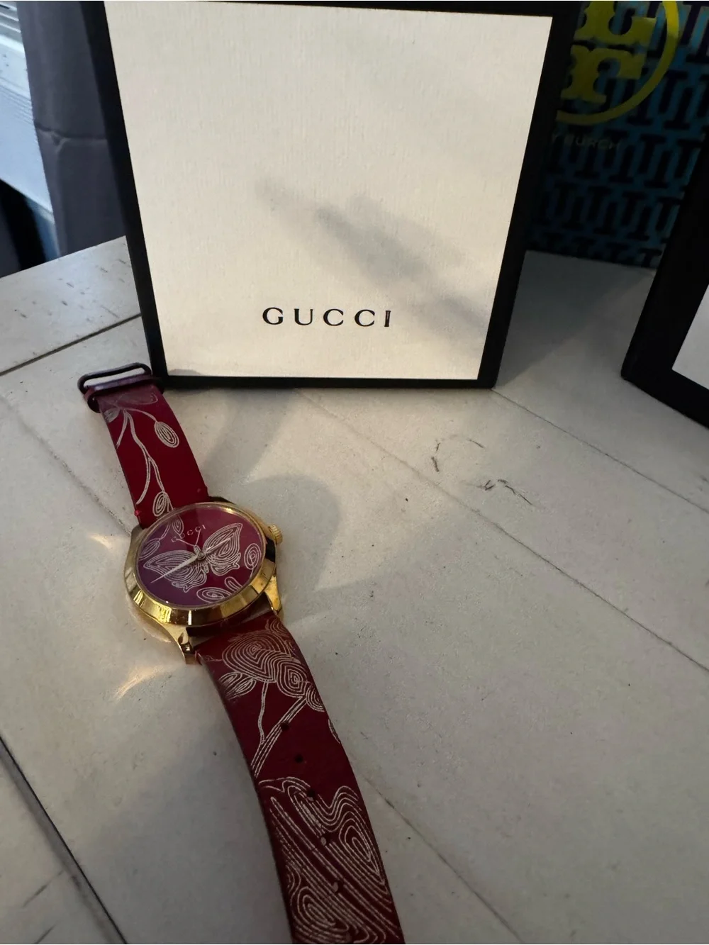 Gucci Gold-Tone Case Watch with Red Butterfly Strap